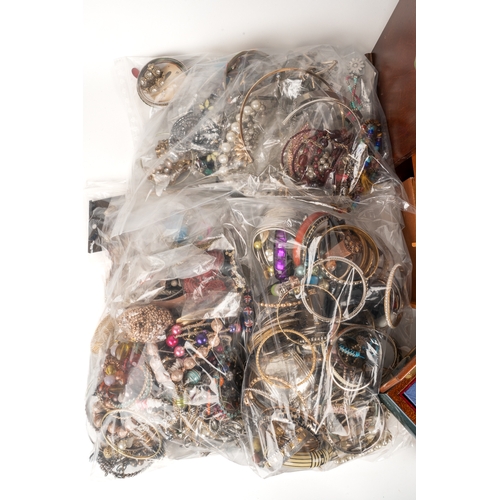 20 - A large quantity of costume jewellery, including bracelets, bangles, earrings, necklaces, brooches e... 