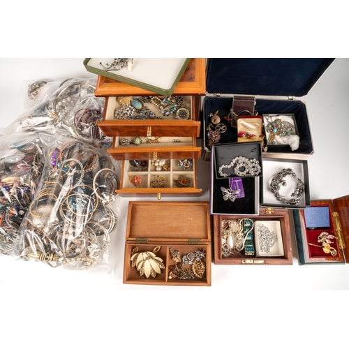 20 - A large quantity of costume jewellery, including bracelets, bangles, earrings, necklaces, brooches e... 