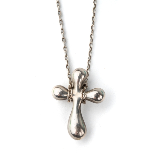 26 - Tiffany & Co - a silver cross pendant by Elsa Peretti, 15mm long, to a fine link silver chain,with s... 