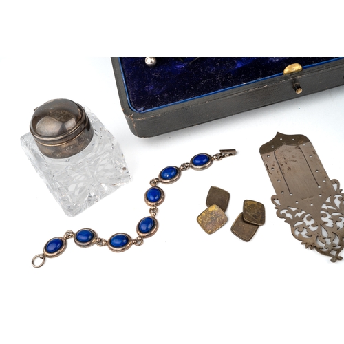 37 - A collection of silver, to include an Elkington & Co silver three-piece cruet, blue glass liners, ca... 