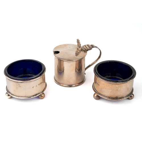 37 - A collection of silver, to include an Elkington & Co silver three-piece cruet, blue glass liners, ca... 