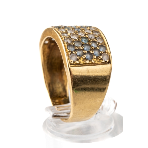 43 - An 18ct yellow gold pale sapphire and white stone ring, stamped '750', ring size R1/2, total gross w... 