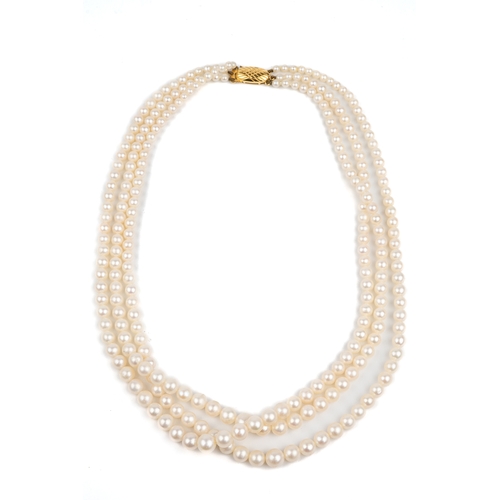 47 - A three-row graduated cultured pearl necklace, with a 9ct yellow gold clasp, approx 42cm long