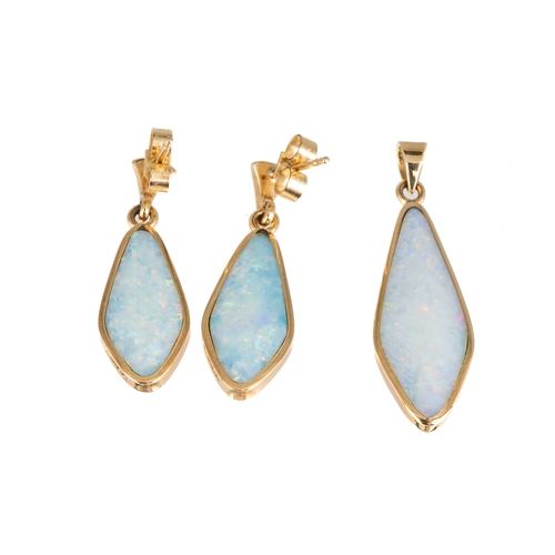 55 - A 9ct yellow gold and opal earring and pendant set, the lozenge shape opals in rub-over settings, po... 