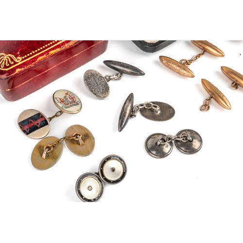 63 - A collection of cufflinks, including a pair of 9ct gold collar studs and a yellow metal and seedpear... 