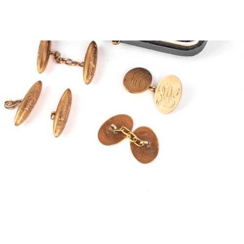 63 - A collection of cufflinks, including a pair of 9ct gold collar studs and a yellow metal and seedpear... 