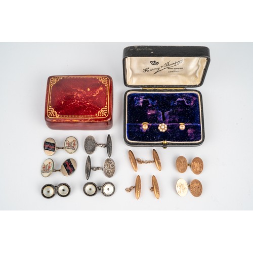 63 - A collection of cufflinks, including a pair of 9ct gold collar studs and a yellow metal and seedpear... 