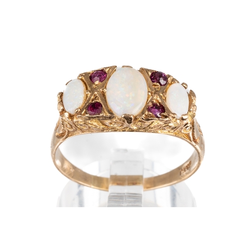 67 - A 9ct yellow gold opal and ruby ring, the three graduated oval cabochon opals with ruby highlights, ... 