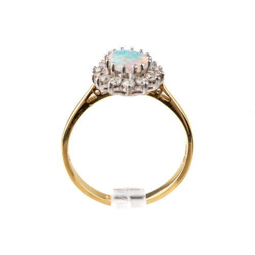 71 - An 18ct yellow gold opal and diamond oval cluster ring, size Q1/2, total gross weight approx 3.8g