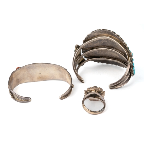 72 - A collection of vintage silver Navajo turquoise set jewellery, to include two bangles, a pair of ear... 