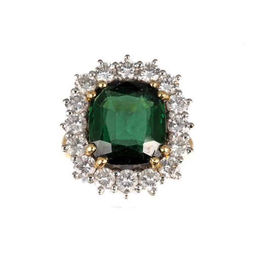 76 - An 18ct yellow gold green tourmaline and diamond square cluster ring, the cushion cut tourmaline app... 