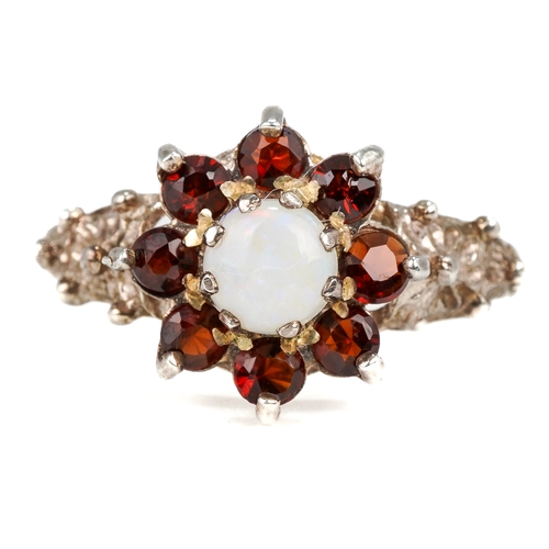 86 - A silver opal and garnet ring, size L, total gross weight approx 1.9g