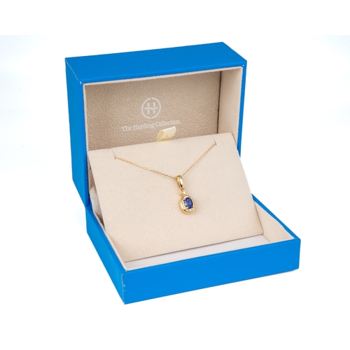 88 - A 14k yellow gold tanzanite and diamond oval pendant, on a fine gold chain, total gross weight appro... 