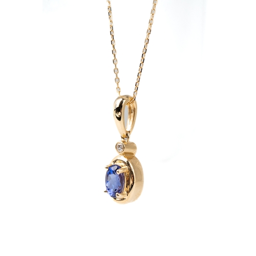 88 - A 14k yellow gold tanzanite and diamond oval pendant, on a fine gold chain, total gross weight appro... 