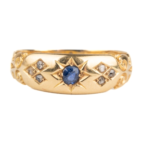 91 - An 18ct yellow gold sapphire and diamond chip ring, size P, total gross weight approx 3.1g