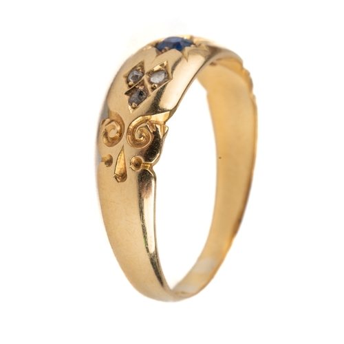 91 - An 18ct yellow gold sapphire and diamond chip ring, size P, total gross weight approx 3.1g