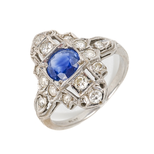 102 - An Art Deco platinum sapphire and diamond dress ring, the central round cut sapphire approx 6.2mm di... 