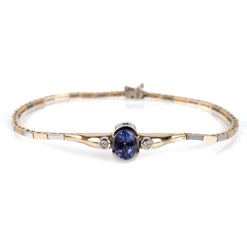 106 - A 14ct bi-colour gold tanzanite and diamond bracelet, set with an oval cut tanzanite approx 1.07cts,... 