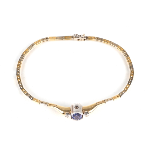 106 - A 14ct bi-colour gold tanzanite and diamond bracelet, set with an oval cut tanzanite approx 1.07cts,... 