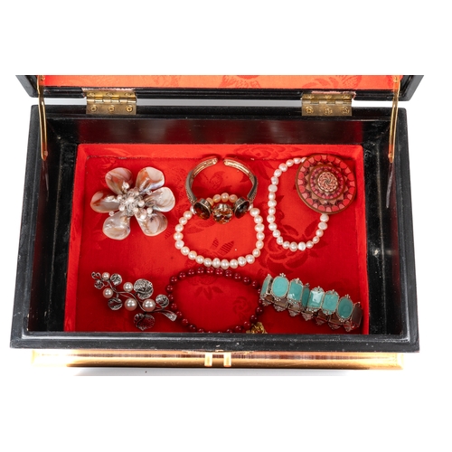 118 - A collection of silver jewellery, including gem-set rings; bangle; costume jewellery; in a Chinese l... 