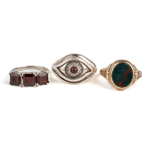 120 - A yellow gold and bloodstone ring, size R1/2, total gross weight approx 5.6g; two silver gem-set rin... 