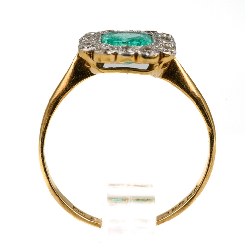 131 - An 18ct yellow gold emerald and diamond ring, the emerald-cut stone surrounded by fourteen round cut... 