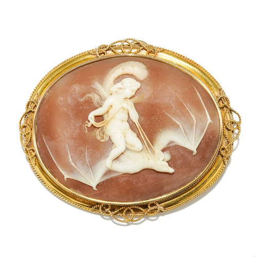 A mid-19th century oval cameo brooch depicting Ariel, riding on a bat with a feather, mounted in a yellow gold frame, unmarked assessed as approx 18ct, hinged pin and C-scroll clasp, approx 7cm x 6cm, total gross weight approx 23.5g, with pendant loop

Ariel is a spirit who appears in William Shakespeare's play The Tempest