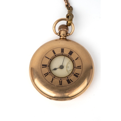 141 - A 9ct gold Rolex half hunter pocket watch, the outer case with blue enamel Roman numerals, the white... 