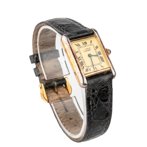 153 - A ladies Must De Cartier Tank silver-gilt wristwatch, original black croc strap, with pouch and pape... 