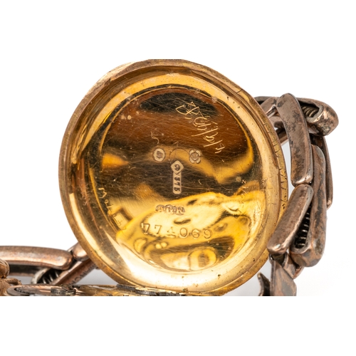 156 - A ladies 9ct yellow gold circular wristwatch, on a gold plated strap; and another, with a gold plate... 