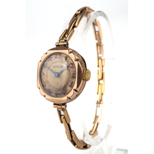 166 - A ladies 1920s 9ct yellow gold wristwatch, Arabic numerals, expanding bracelet, with extra strap, to... 