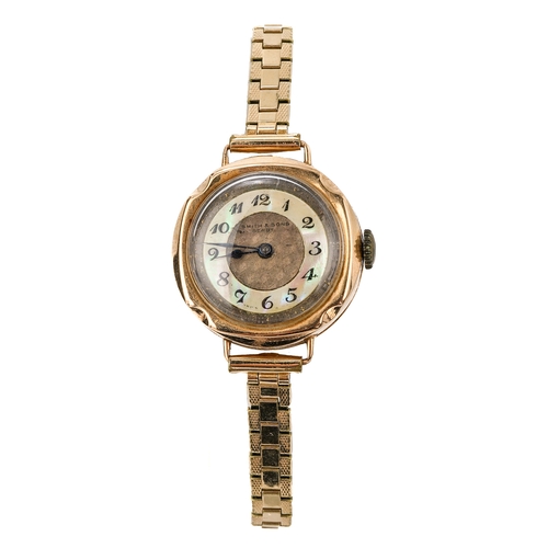 170 - A 9ct gold cased ladies wristwatch, mother of pearl chapter ring, Arabic numerals, gold plated strap... 