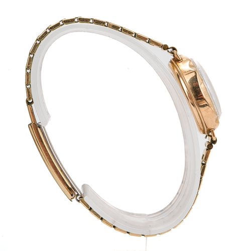 170 - A 9ct gold cased ladies wristwatch, mother of pearl chapter ring, Arabic numerals, gold plated strap... 