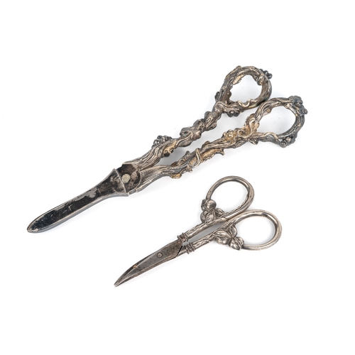 180 - A pair of contiental 935 silver handled scissors, floral terminals; and a pair of Elkington & Co pla... 