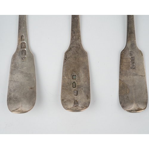 203 - Three 18th Century Irish silver fiddle pattern table spoons with rat tails, engraved with initials, ... 