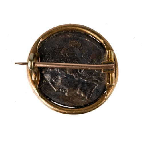 223 - A Greek silver coin, mounted in yellow metal brooch fitting