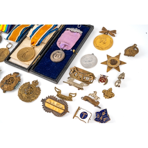 231 - Militaria - a WWI medal group, a 1914-1918 silver medal and a Great War for Civilisation medal,  awa... 