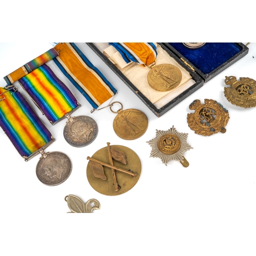 231 - Militaria - a WWI medal group, a 1914-1918 silver medal and a Great War for Civilisation medal,  awa... 