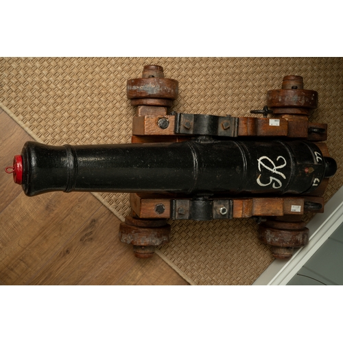 237 - An English solid cast iron cannon, believed to come from HMS Drake. Repainted approximately  40 year... 