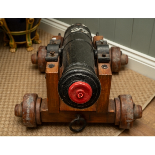 237 - An English solid cast iron cannon, believed to come from HMS Drake. Repainted approximately  40 year... 