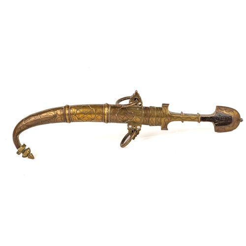 250 - A 19th century Moroccan jambiya koummya, having 23.5 cm curved blade, with a brass, silver and ename... 