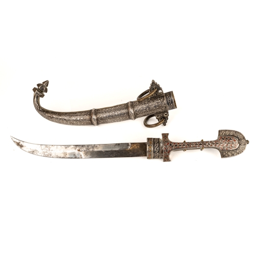 250 - A 19th century Moroccan jambiya koummya, having 23.5 cm curved blade, with a brass, silver and ename... 