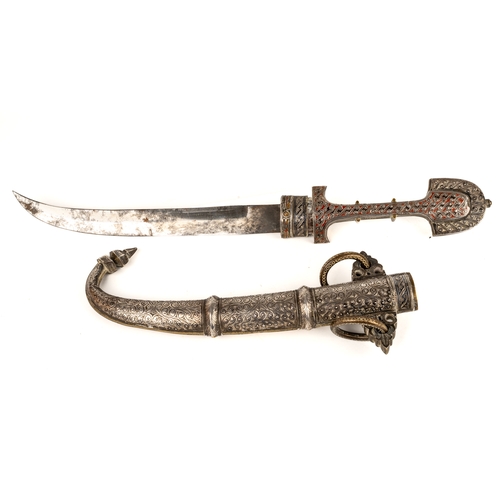 250 - A 19th century Moroccan jambiya koummya, having 23.5 cm curved blade, with a brass, silver and ename... 