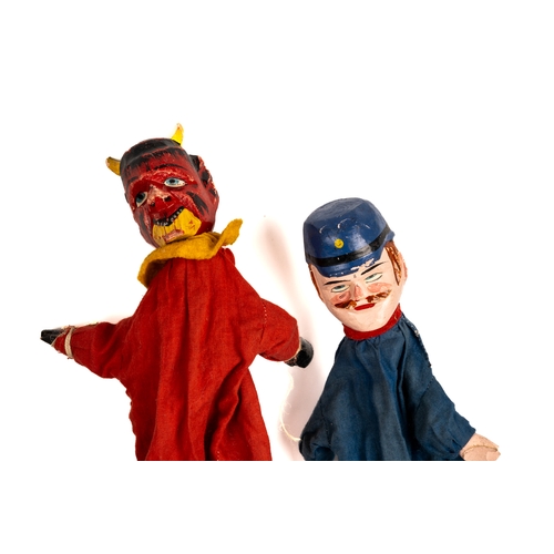 256 - Five vintage carved wood Punch and Judy hand puppets.