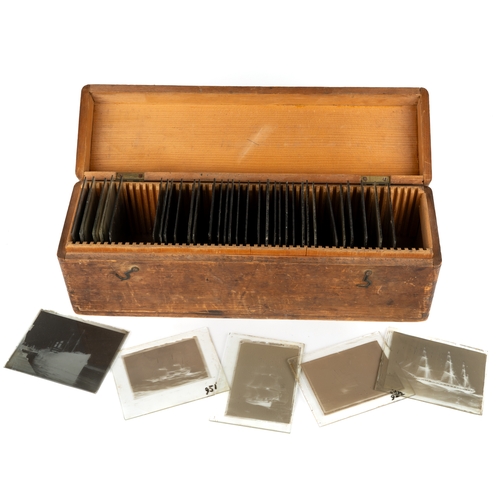 265 - A collection of 37 Victorian and later glass plate negative slide photographs of ships in wooden box