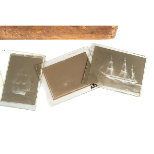 265 - A collection of 37 Victorian and later glass plate negative slide photographs of ships in wooden box