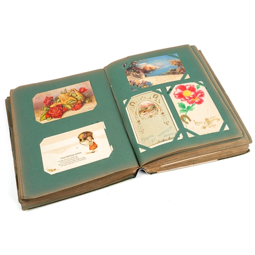 271 - A large post card album, containing approx 500 postcards and birthday cards, some hand tinted, circa... 