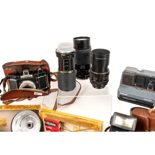 277 - A collection of cameras and lenses, including Kenilworth box camera; Kodak Brownie Flash IV; Coro-Fl... 