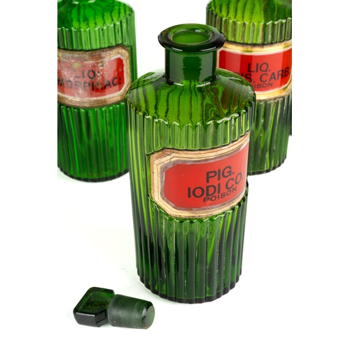 284 - Medical interest. 10 antique green ribbed glass chemist bottles. 5 marked poison, all different name... 