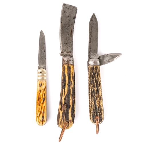 306 - A collection of three naval knives, including T Turner & Co rope knife, E Barnes horn handled knife ... 